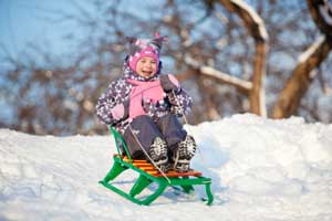Photo child on a sled