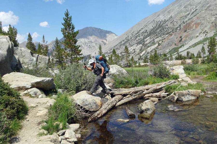 Crossing creek in High Sierra, CA